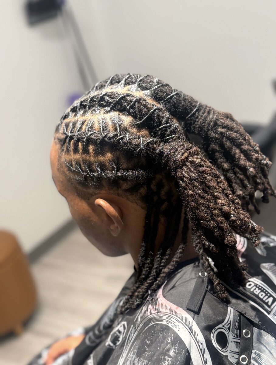 Loc retwist side profile at Bud Kutz